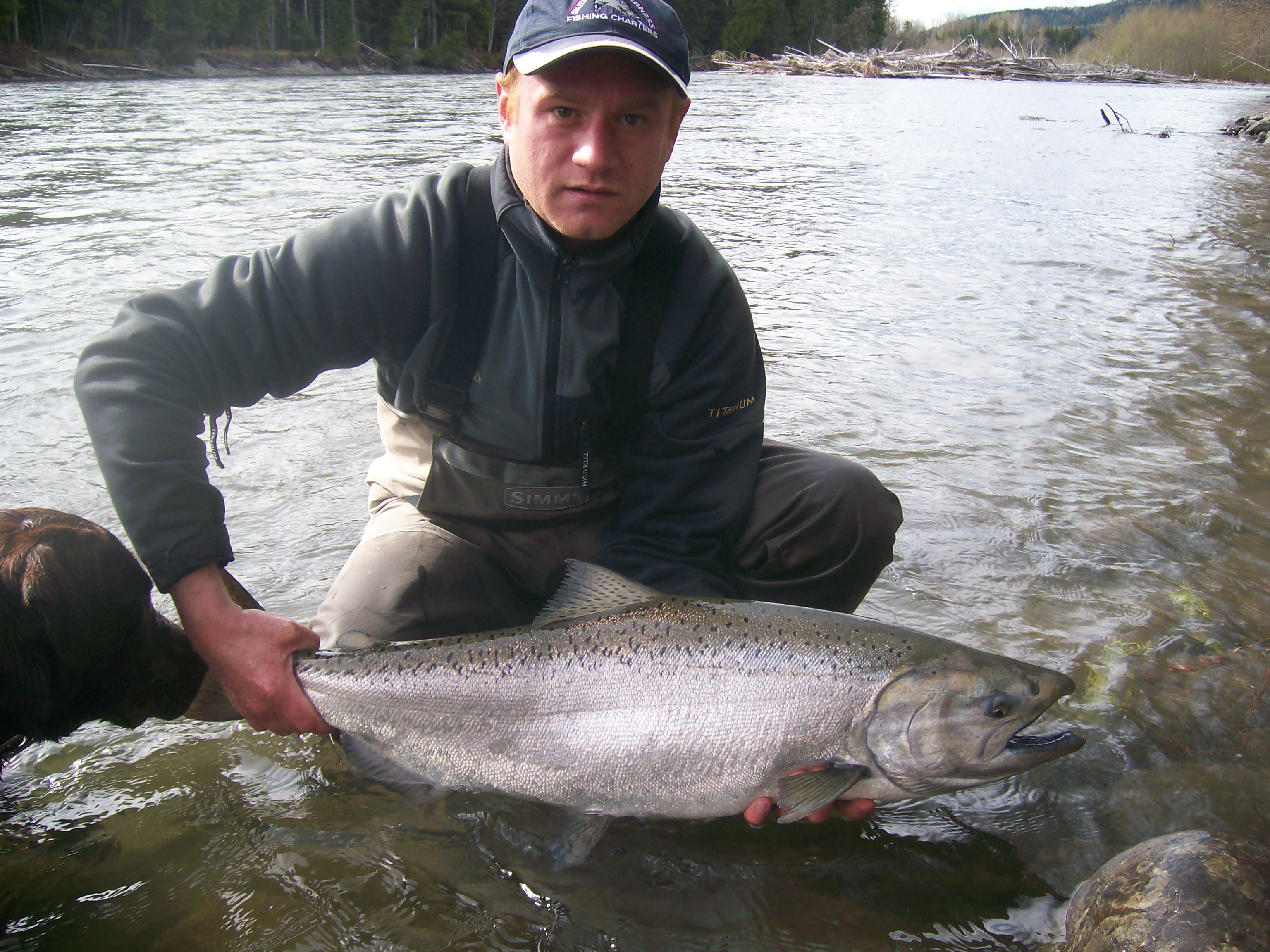 Angler displaying a salmon from northern British Columbia waters
